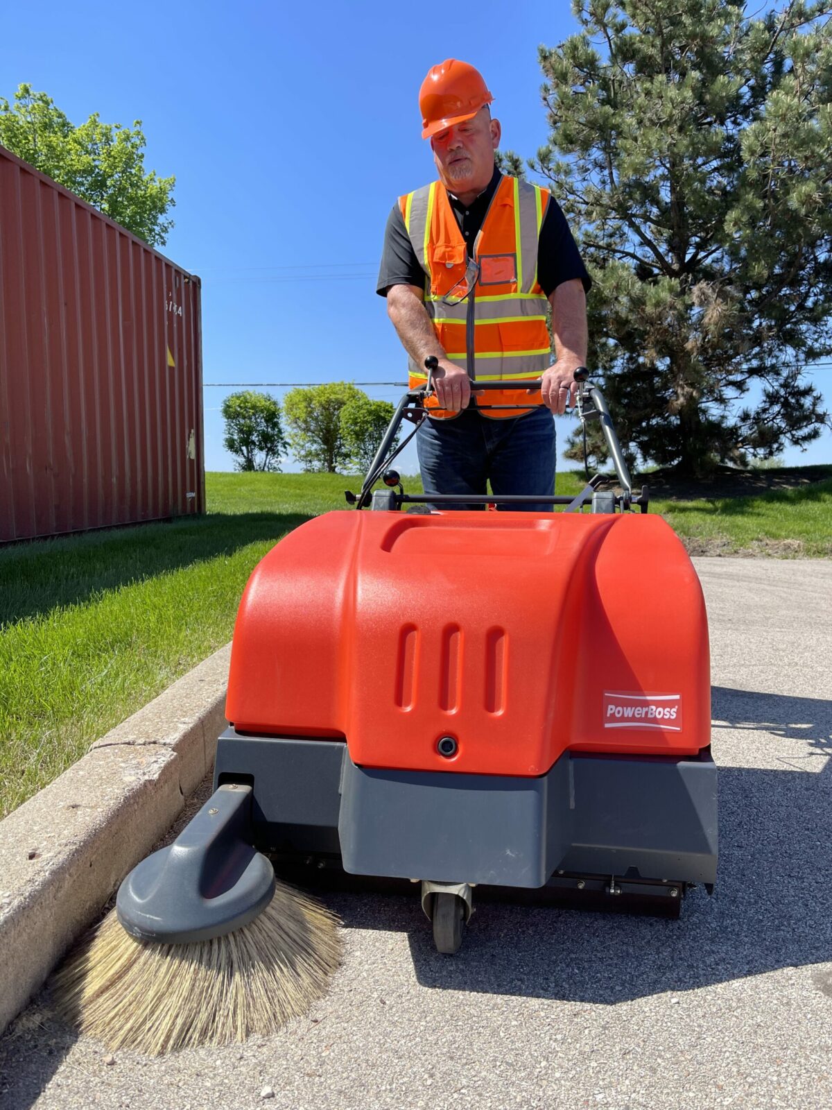 PowerBoss Collector 34 Walk-behind sweeper along curb