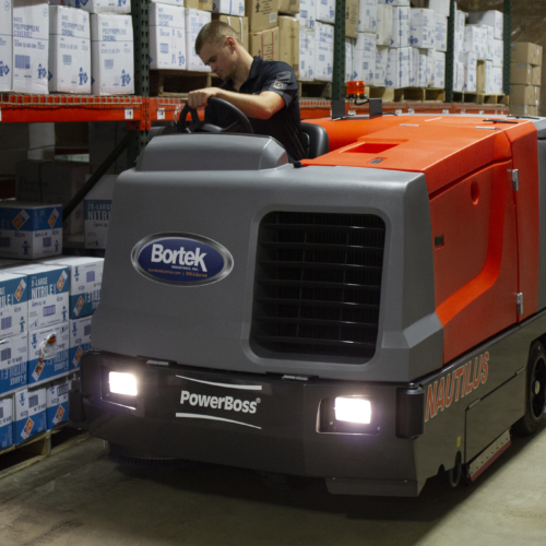 PowerBoss Nautilus scrubbing warehouse floor