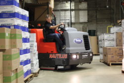 PowerBoss Nautilus Industrial Floor Scrubber in a warehouse