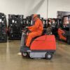 PowerBoss Apex 47 sweeping a warehouse