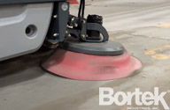 Dust Stop Side Broom Jacket on Apex 58 Sweeper in Use